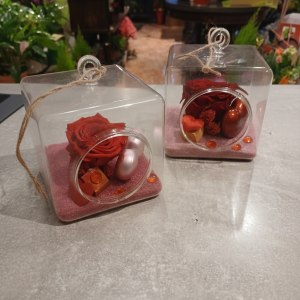 Rose rouge éternelle avec sable