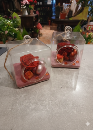 Rose rouge éternelle avec sable